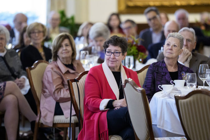 League member listens attentively