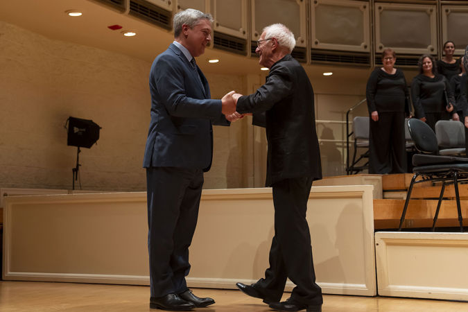 conductor shaking hands