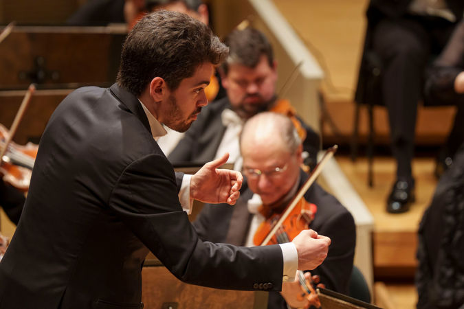 Shani conducting