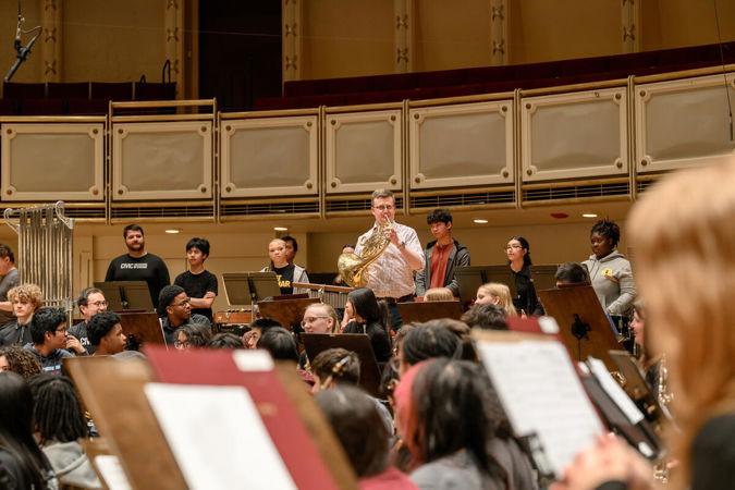Principal Horn Mark Almond and students