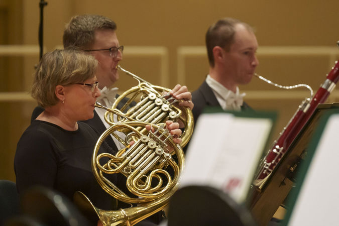 two horn players