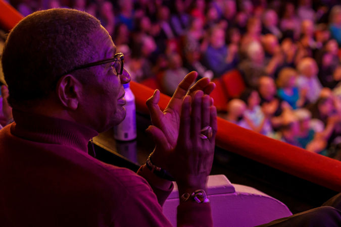 audience member clapping