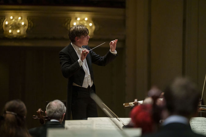 Closeup of Zell Music Director Designate Klaus Mäkelä leading the CSO in Mahler 3