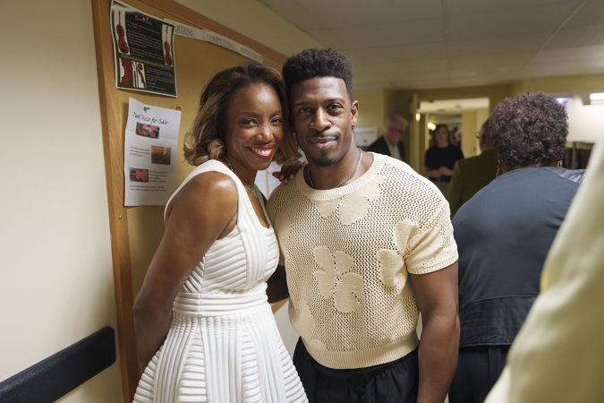 A backstage photo of singers Heather Headley and Curtis Bannister