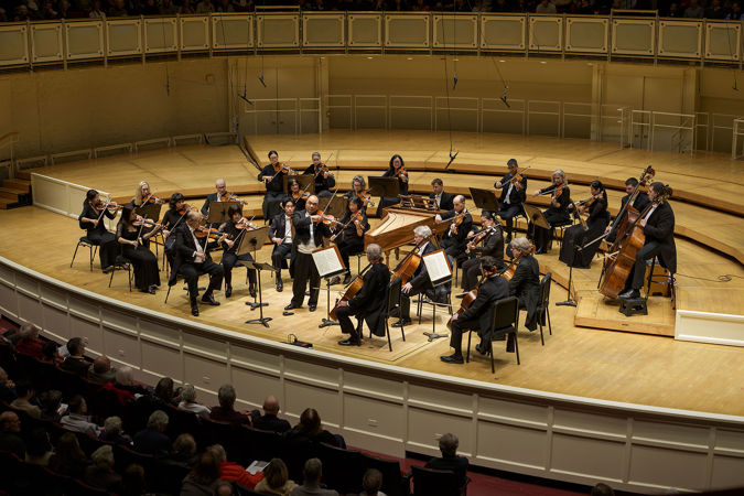 the full string orchestra performs Vivaldi's The Four Seasons