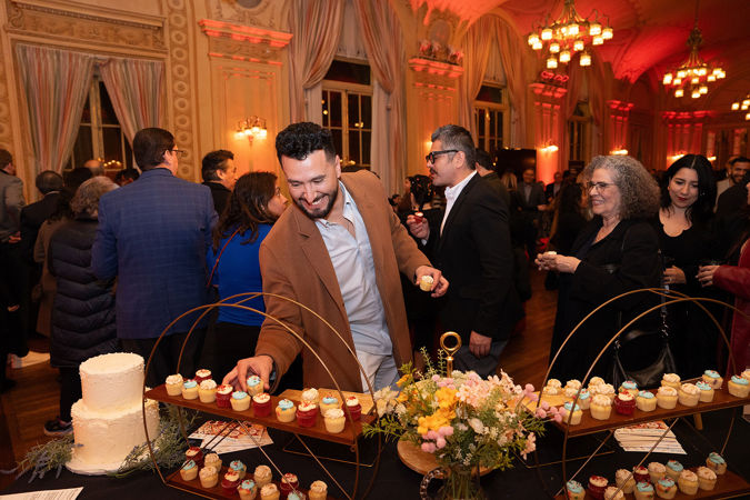 The Boleros de Noche concert April 12 marked a record attendance for a Nuestras Noches event. At the postconcert reception in Grainger Ballroom, Latino Alliance members and guests piled their plates high with beautifully decorated mini cakes, generously provided by Molly's Cupcakes