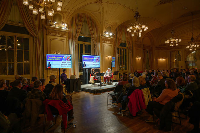 CSO cello Katinka Kleijn and host Terri Hemmert chat about the evening's program during Classic Encounter in Grainger Ballroom