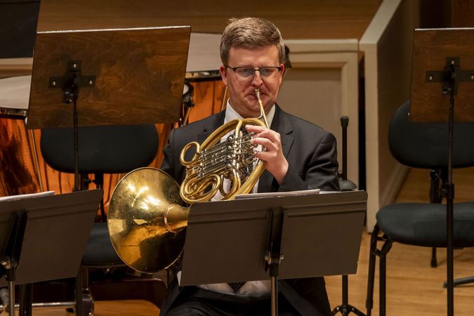 CSO principal horn Mark Almond performs