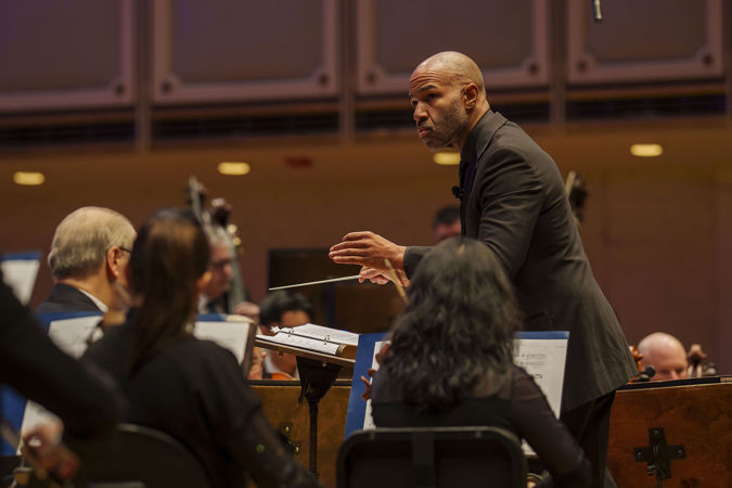 Guest conductor Daniel Bartholomew-Poyser leading members of the CSO