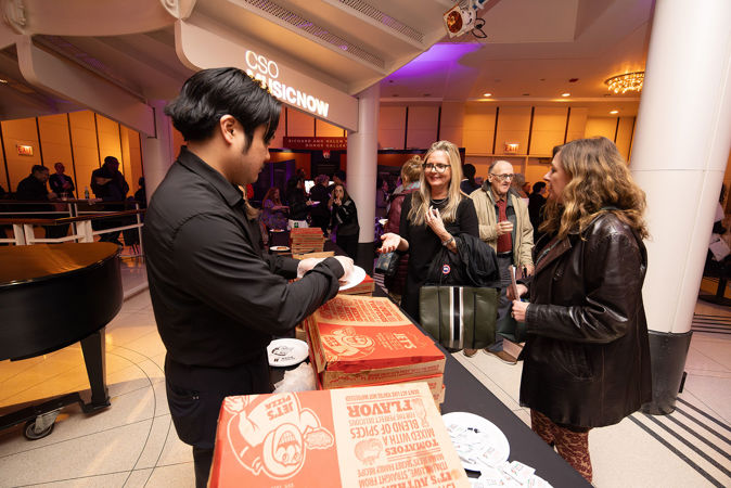 pizza is served in the Rotunda at the afterparty