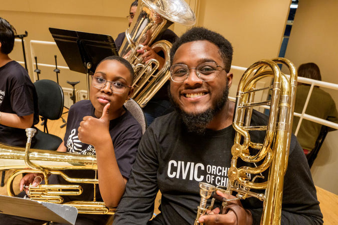 Civic bass trombone Timothy Warner with student