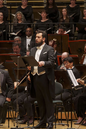 Bass-baritone Maharram Huseynov sings a solo passage