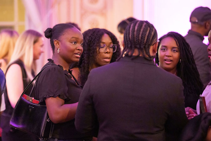 Four Underground attendees chatting in Grainger Ballroom