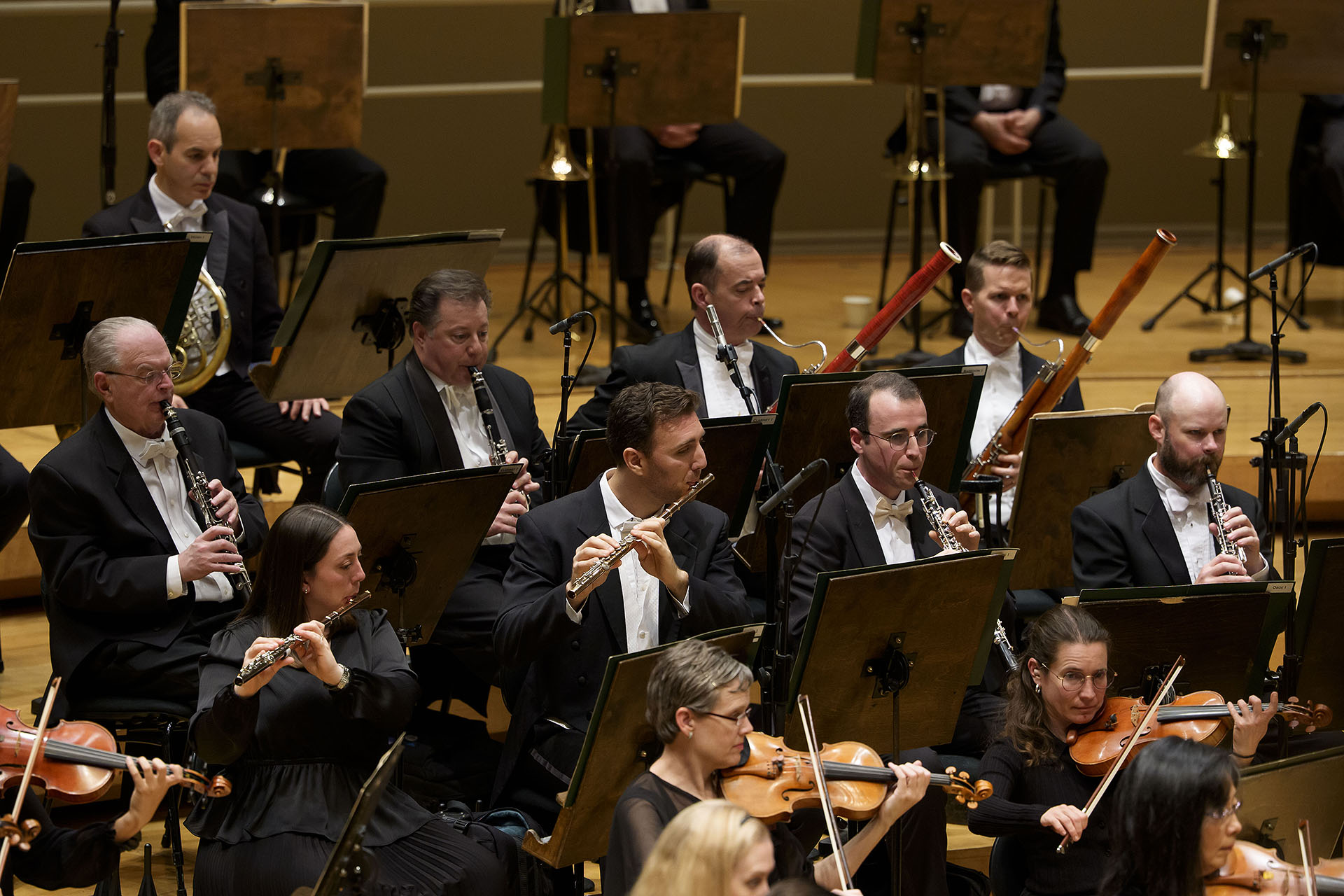 members of the CSO winds section on stage