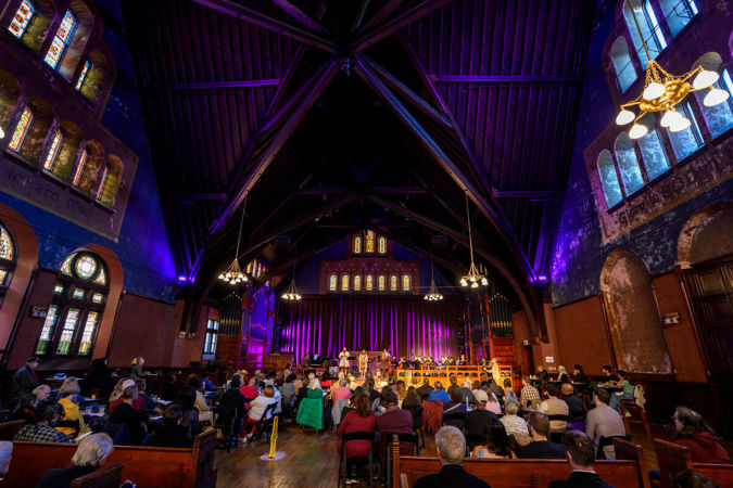 Families and loved ones gather at the Epiphany Center for the Arts for a Notes for Peace concert.