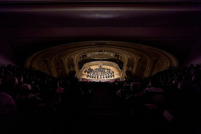 Wide shot of Berliner Philharmonker performing on stage