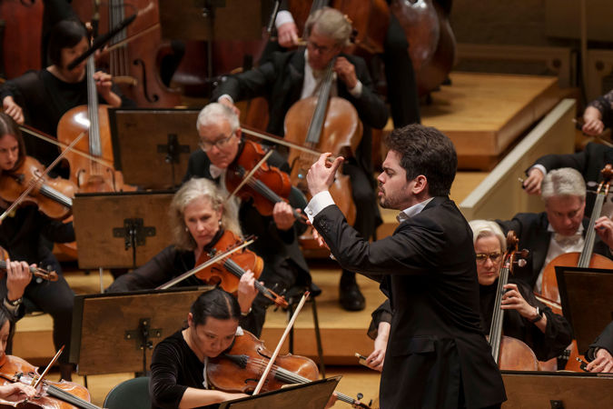Shani conducting