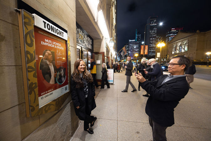 woman poses outside venue