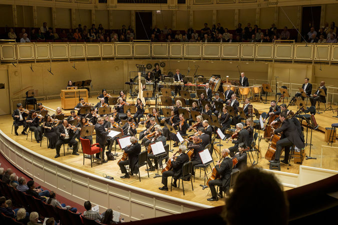 Wide shot of the Chicago Symphony Orchestra and conductor Mikko Franck
