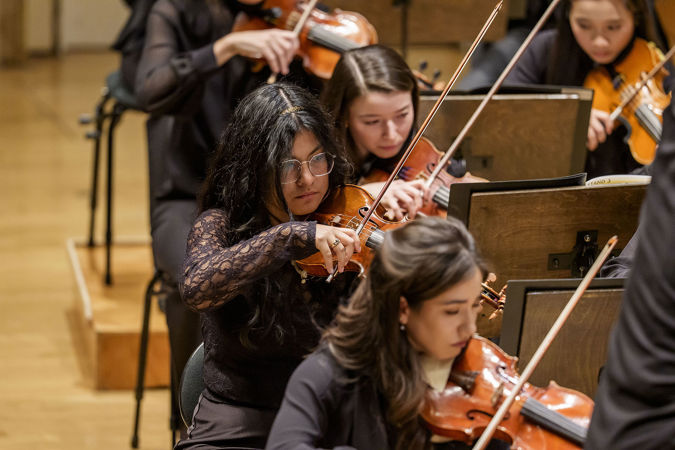 Closeup action shot of a Civic violinist