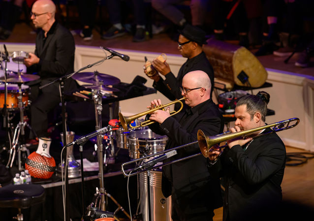 the brass section of Pink Martini