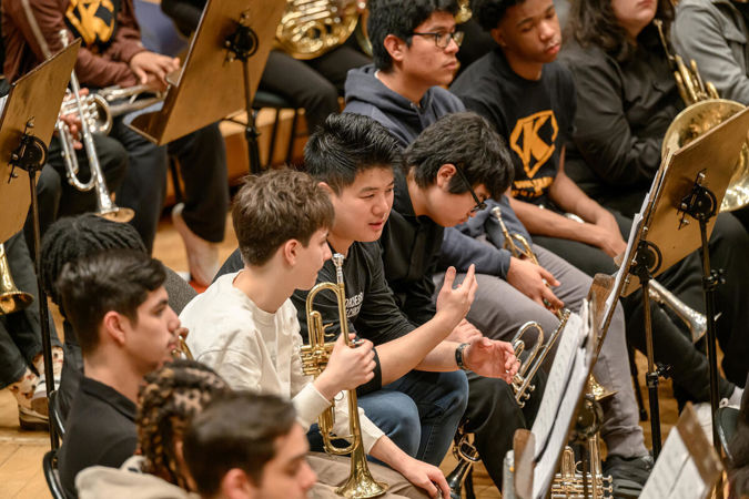 Civic trumpet Abner Wong and students