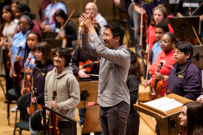 Conductor Kenny Lee and students