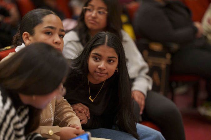 A young audience member chatting with friends on the Main Floor before the CSO for Kids concert