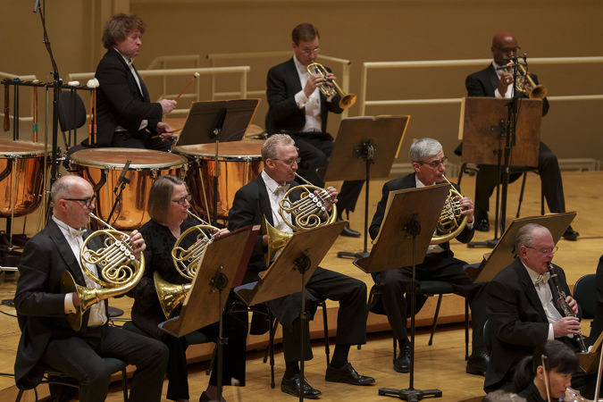 Group action shot of the CSO horn and percussion section