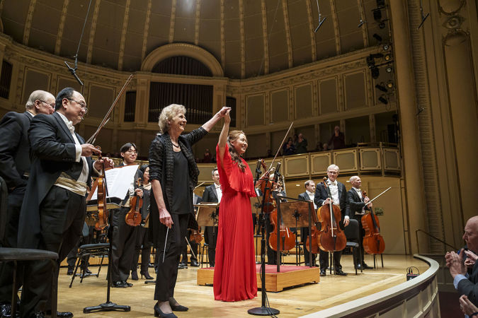 violinist Stella Chen and conductor Dame Jane Glover take a bow together